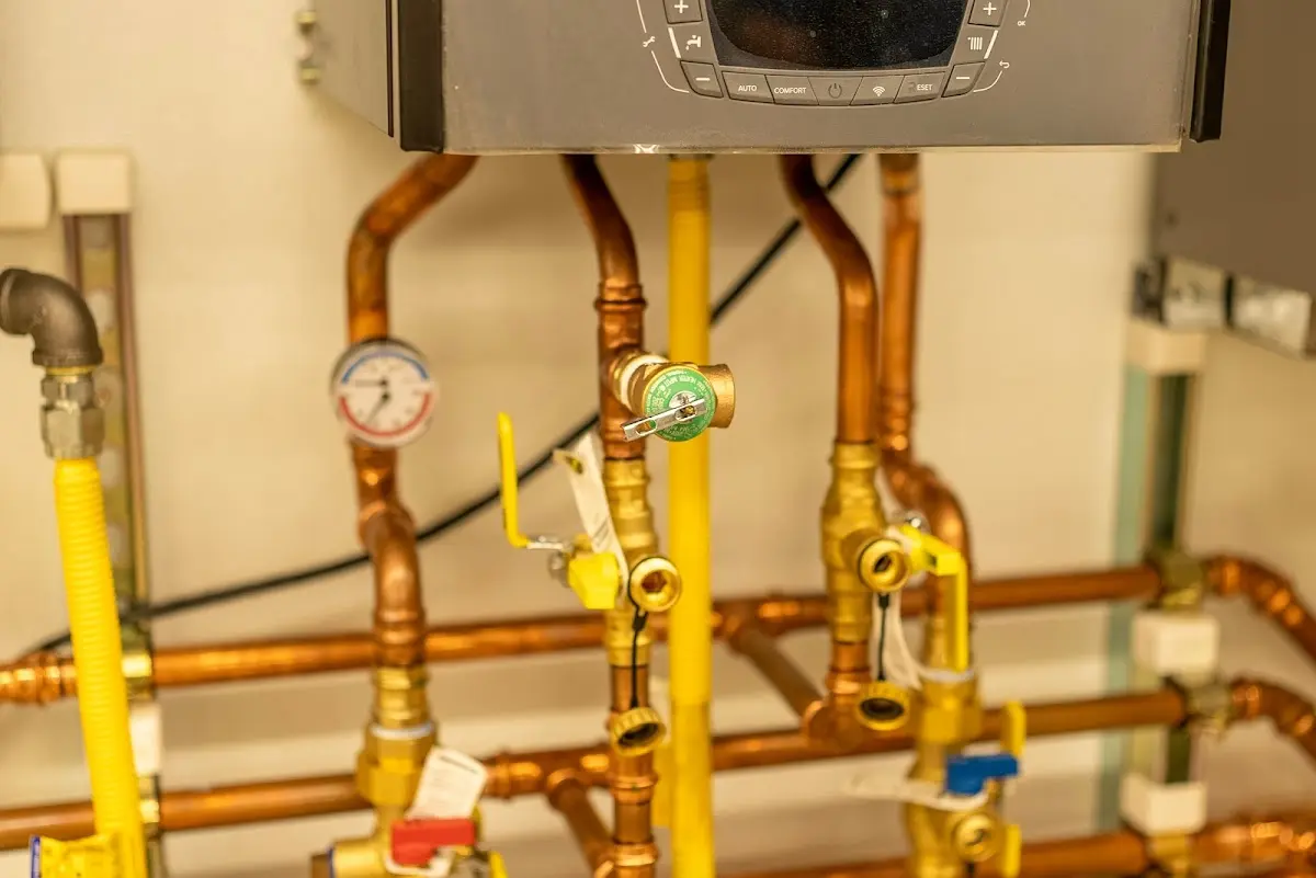 Licensed technician providing Backflow Prevention for a homeowner in Ishpeming